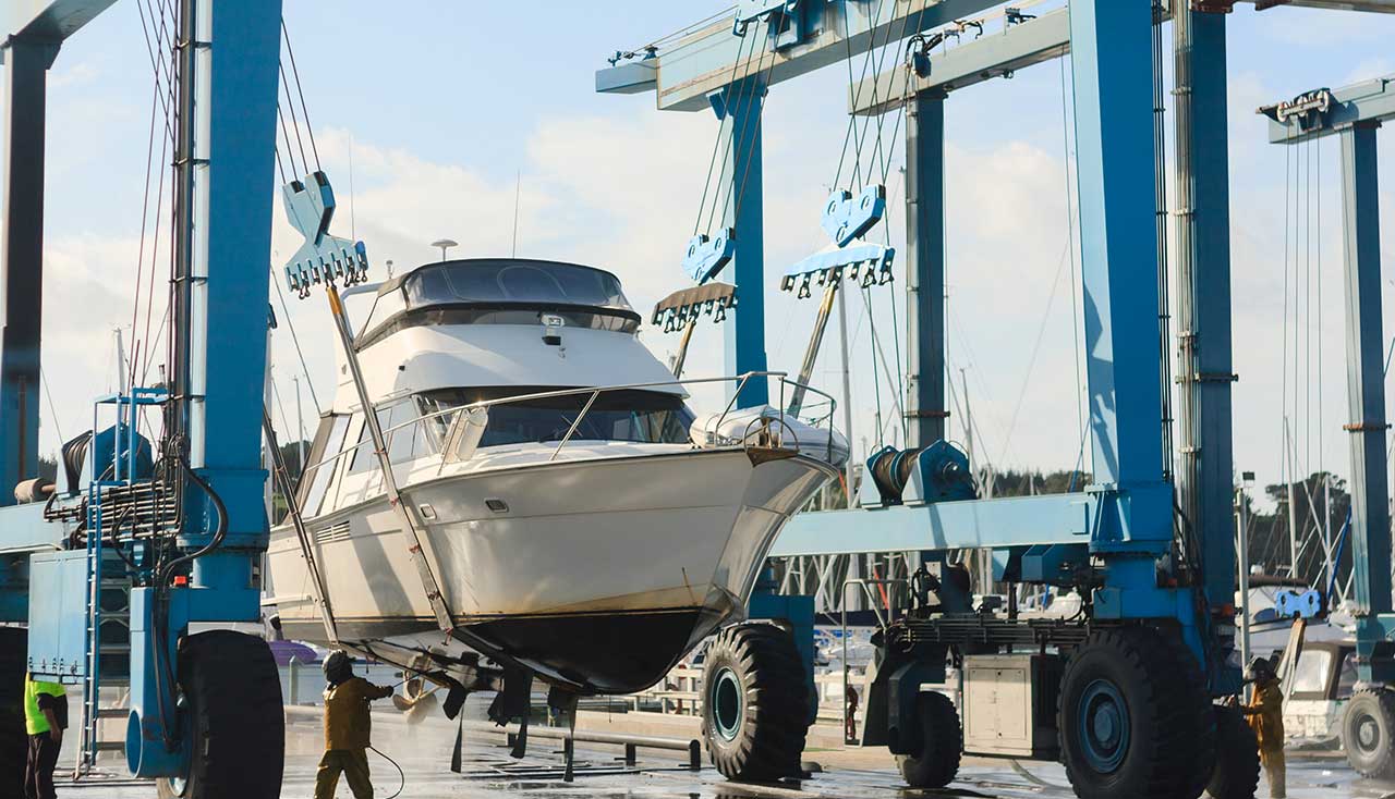Boat raised on a marina service lift